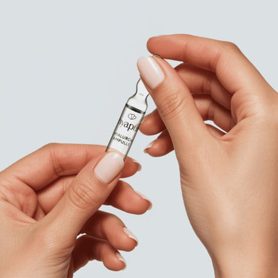 2. Apply the contents of one ampoule to slightly damp skin and gently pat in.